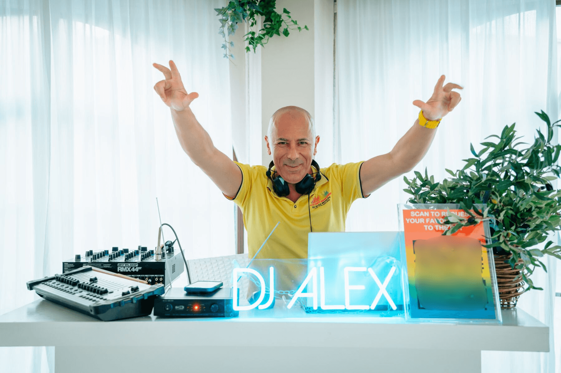 DJ Alex Bedeleu at a destination wedding DJ booth